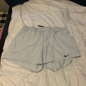 White Nike shorts